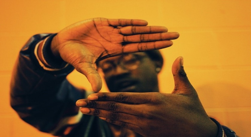 Black man picture hands credit Mikaala Shackelford/Unsplash